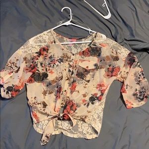 Dolled up by F.A.N.G. Tie Front Blouse